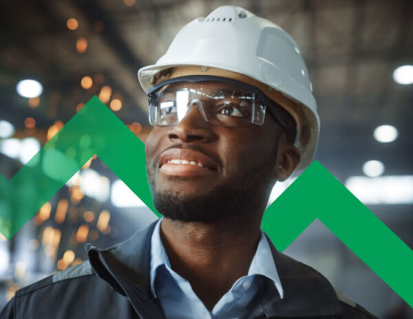 Young Afro-American worker looking up with a hopeful expression.